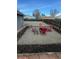 Inviting backyard features a gravel area with outdoor seating, perfect for gatherings and relaxation at 2881 W 65Th Ave, Denver, CO 80221