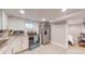 Bright and updated basement kitchen featuring stainless steel appliances and granite countertops at 2881 W 65Th Ave, Denver, CO 80221