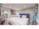 Spacious basement bedroom with king bed, TV and plenty of natural light at 2881 W 65Th Ave, Denver, CO 80221