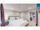 Spacious basement bedroom with king bed and access to laundry room at 2881 W 65Th Ave, Denver, CO 80221
