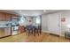 Modern kitchen with stainless steel appliances and hardwood floors at 2881 W 65Th Ave, Denver, CO 80221