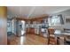 Updated kitchen featuring stainless steel appliances and wood floors at 2881 W 65Th Ave, Denver, CO 80221