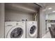 Basement laundry room with washer and dryer at 2881 W 65Th Ave, Denver, CO 80221