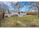 Spacious backyard with a large deck, perfect for outdoor entertaining and relaxation at 9565 W 12Th Pl, Lakewood, CO 80215