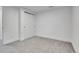 Bright bedroom with carpet, closet with sliding doors, and fresh white trim at 9565 W 12Th Pl, Lakewood, CO 80215