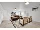 Modern living room features plush seating, stylish decor, and a cozy atmosphere at 9565 W 12Th Pl, Lakewood, CO 80215
