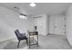 Functional office space with a modern desk, comfortable chair, and ample closet space at 9565 W 12Th Pl, Lakewood, CO 80215
