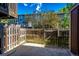 Fenced backyard with a concrete patio, providing privacy and a great space for outdoor enjoyment at 8231 S Fillmore Way, Centennial, CO 80122