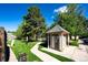Community amenities featuring a pool and changing rooms, surrounded by lush landscaping at 8231 S Fillmore Way, Centennial, CO 80122