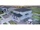 Stunning two-story home showcasing professional landscaping and a golf course view at 16701 Buffalo Run Dr, Commerce City, CO 80022
