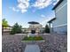 Relaxing patio area with comfortable seating and a fire pit, perfect for enjoying the outdoors at 16701 Buffalo Run Dr, Commerce City, CO 80022