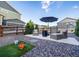 Outdoor patio featuring a fire pit and comfortable seating at 16701 Buffalo Run Dr, Commerce City, CO 80022