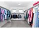 Large walk-in closet with custom closet organizers at 16701 Buffalo Run Dr, Commerce City, CO 80022