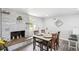 Charming dining area with stone fireplace and modern decor at 309 W Oak St, Lafayette, CO 80026