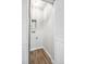 Small Laundry room area located behind white louvered doors at 309 W Oak St, Lafayette, CO 80026