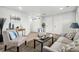 Inviting living room featuring modern decor and abundant natural light at 309 W Oak St, Lafayette, CO 80026
