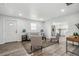 Comfortable living room featuring neutral decor and access to the kitchen at 309 W Oak St, Lafayette, CO 80026