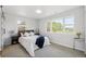 Well-lit bedroom featuring plush carpeting, modern finishes and views to the outside at 309 W Oak St, Lafayette, CO 80026