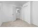 Basement room with large closet and open doorway at 5562 Anaheim Way, Denver, CO 80239