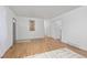 Bright living room showcasing hardwood floors and a neutral color palette at 5562 Anaheim Way, Denver, CO 80239