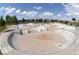Well-maintained skatepark with various ramps, bowls, and features for skateboarding enthusiasts at 5562 Anaheim Way, Denver, CO 80239