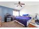 Comfortable bedroom with vaulted ceilings, ample natural light, and a large bed for restful nights at 12134 Glencoe St, Thornton, CO 80241
