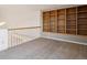 Loft space featuring custom built-in shelving and lots of light from skylights at 2846 W Centennial Dr # E, Littleton, CO 80123