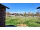 A scenic view from a condo overlooking a lush green space at 2846 W Centennial Dr # E, Littleton, CO 80123