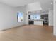 Bright open-concept living room and kitchen with modern finishes and large windows at 14245 Currant St, Broomfield, CO 80020