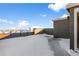 A rooftop deck covered in snow offering panoramic views under a blue sky at 14245 Currant St, Broomfield, CO 80020