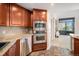 Beautiful kitchen with stainless steel appliances and marble countertops at 8100 E. Union Ave # 409, Denver, CO 80237