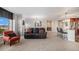 Comfortable living room features neutral tones, carpet, and a view of the city at 8100 E. Union Ave # 409, Denver, CO 80237