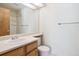 Clean bathroom features a large mirror, updated fixtures and plenty of natural light at 4656 S Dillon Ct # D, Aurora, CO 80015