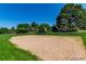 A volleyball court on a sunny day with blue skies and green grass at 4656 S Dillon Ct # D, Aurora, CO 80015