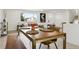 Inviting dining area with stylish furniture and great natural light, perfect for Gathering gatherings and entertaining at 7114 S Costilla St, Littleton, CO 80120