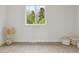 Bright empty room with light-colored wooden floors at 7114 S Costilla St, Littleton, CO 80120