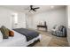 Spacious main bedroom features a ceiling fan, sitting area, and ensuite bathroom entrance at 7202 S Valleyhead Ct, Aurora, CO 80016