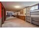 Spacious finished basement with a pool table, built-in shelving, and recreational area at 8731 W 89Th Pl, Broomfield, CO 80021