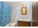 Bathroom featuring a shower/tub combo, toilet, vanity with sink, and a mirrored medicine cabinet at 8731 W 89Th Pl, Broomfield, CO 80021