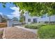 Backyard patio, and hot tub surrounded by well maintained ivy and a gravel garden at 10511 W 101St Ave, Broomfield, CO 80021