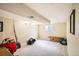 Unfinished basement space with carpet, a window, and blank walls ready to customize at 10511 W 101St Ave, Broomfield, CO 80021
