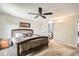 Inviting bedroom with ceiling fan, carpet, and natural light at 10511 W 101St Ave, Broomfield, CO 80021