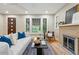 Spacious living room with hardwood floors and a modern decor at 1312 Ash St, Denver, CO 80220