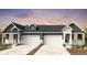 Charming paired home featuring a contemporary design, two-car garage, and inviting curb appeal at 3411 N Denali St, Aurora, CO 80019