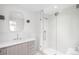 Elegant bathroom with a walk-in shower, sleek vanity, and modern fixtures, offering a spa-like experience at 181 Race St, Denver, CO 80206