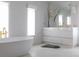 Elegant bathroom boasting a freestanding tub, double vanity, and stylish fixtures at 181 Race St, Denver, CO 80206