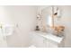 Elegant powder room featuring a stylish vanity, marble countertop, and sophisticated fixtures, creating a luxurious and refined space at 181 Race St, Denver, CO 80206