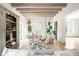 Bright living room showcasing exposed beam ceiling, hardwood floors, and neutral furniture for a cozy atmosphere at 181 Race St, Denver, CO 80206