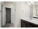 Modern bathroom showcasing a glass-enclosed shower, sleek vanity, and neutral color palette at 350 High Point Dr # C201, Longmont, CO 80504