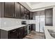 Modern kitchen with granite countertops, stainless steel appliances, and ample cabinet space for the home chef at 350 High Point Dr # C201, Longmont, CO 80504